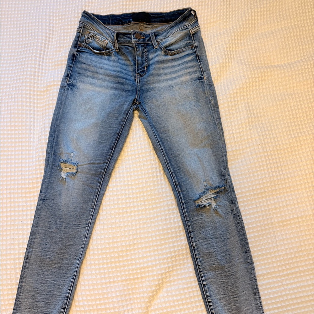 Buckle Light Blue Distressed Skinny Jeans